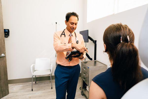 Our provider working in the exam room.