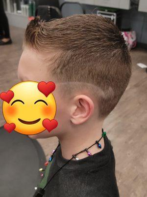 Little boy haircut with design.