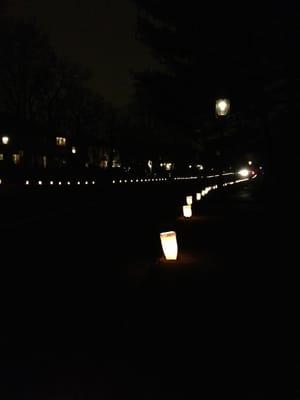 Ridgewood Ave lined with candles on Christmas Eve.