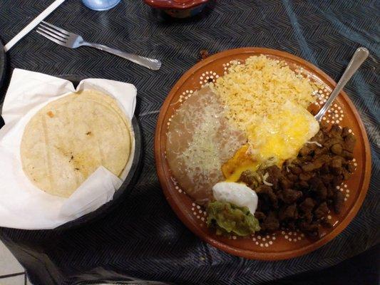 Beef carne asada with corn tortillas