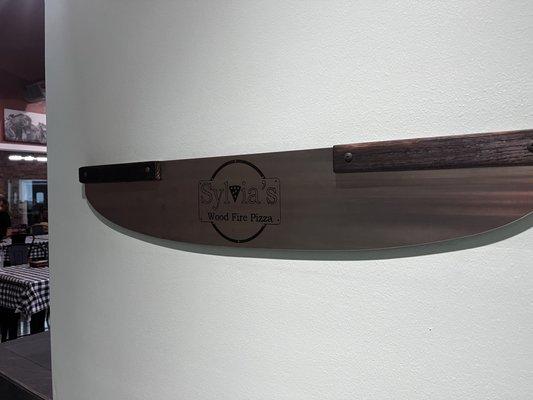 Decorative pizza cutter made by Steel Dog Knives in Tomball