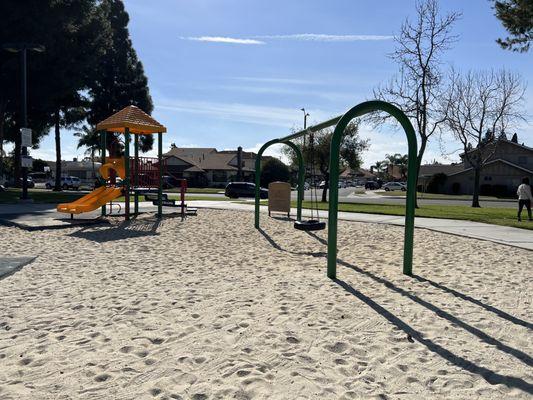 Tiny playground and tire swing