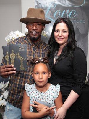 Jamie Foxx and Meagan Holub, Founder of the The Love Institute at the Academy Awards Gift bag Suite.