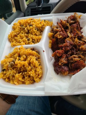 Pork Shoulder (pernil) with arroz con gandules.  Both are excellent.