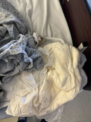 Soiled clothing left on bed for hours