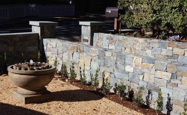 Entry stone walls and fountain.