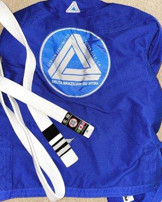 Gi Jacket and third degree white belt!