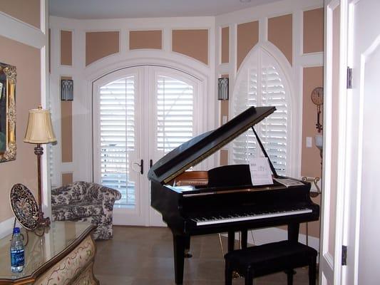 Delta Blinds and Shutters compliment any décor and will protect precious possessions such as this baby grand piano from damaging sunlight.