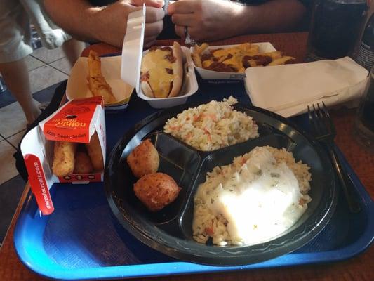 Cheese curds. Baked cod w/ garlic butter Cole slaw and hushpuppies.  Hubby had chili cheese dog. Cod. And chilli cheese fries.