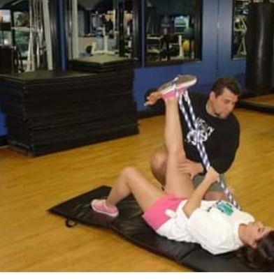 Using activate isolated stretching(ais)..  working... stretching hamstrings.