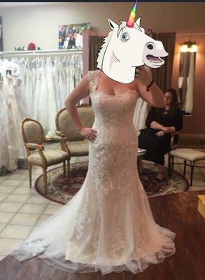 That woman didnt look very impressed seeing a unicorn trying on bridal gowns