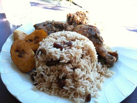 Small jerk chicken plate with rice and plantains