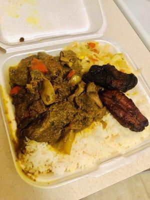 Small Curry goat with white rice, cabbage and sweet plantains