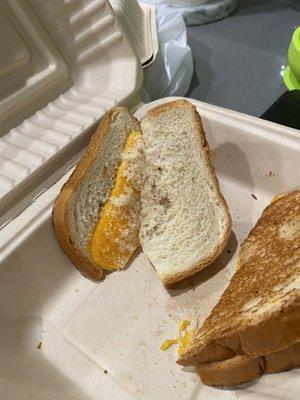 Cheese clumped on half the sandwich $8