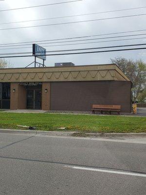 Front entrance on 12 Mile Rd... Nice bench outside