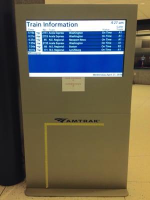 Train information signs throughout the Amtrak train station.