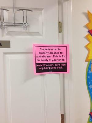 Paper signs posted everywhere about 'proper attire'. Not every child is required to have their child in 'proper attire' though.