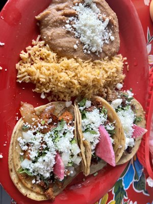 3 taco platter with rice and beans