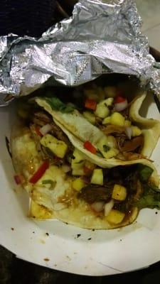 Jerk chicken tacos. Fresh pineapple salsa goes well with that jerky kick!