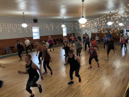 Pumping Dance Aerobics with Strength in every class.