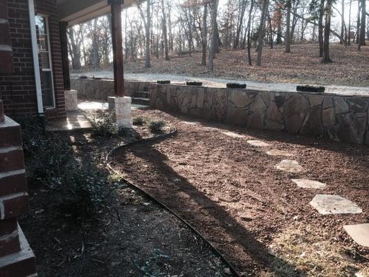 New flagstone wall, new colloms, new flagstone patio