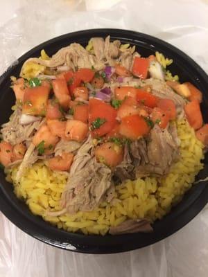 Pork shoulder with yellow rice.