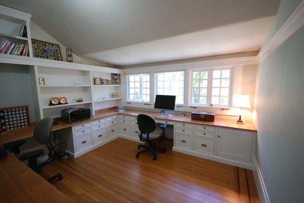 Home office with professional function. Wrap around counters with two work stations.