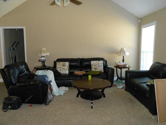 Before:  Living room area lacks focus and purpose.