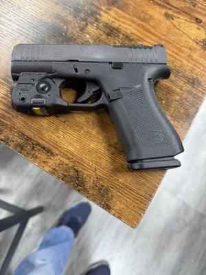 Glock 43X with laser and light.