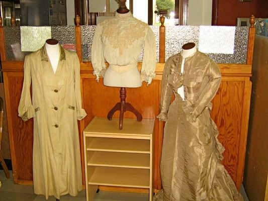 Some period clothing on main floor of the Achives