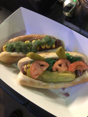 One traditional Chicago style hot dogs, one non-traditional Chicago style hot dog