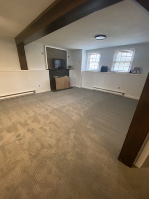 Carpet downstairs on bottom level of split level home