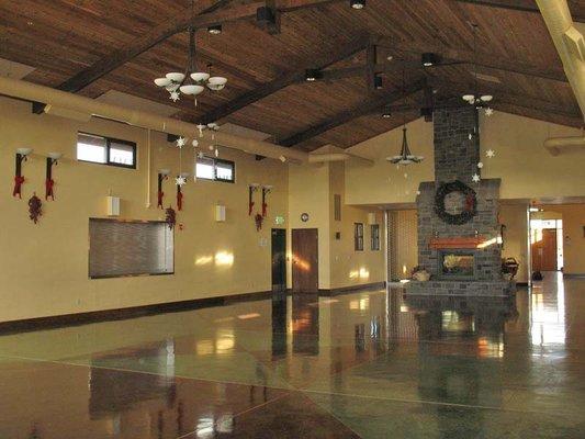 Looking east in the Great Hall towards the double sided gas fireplace.