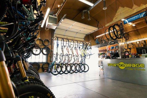 Our garage, filled with premium mountain bike demos from Yeti, Santa Cruz, Pivot, and Rocky Mountain.