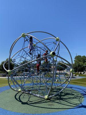 Cool webbed climbing structure.