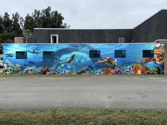 Mural on East side wall of 211 E. New Haven Ave., Melbourne, FL 32901