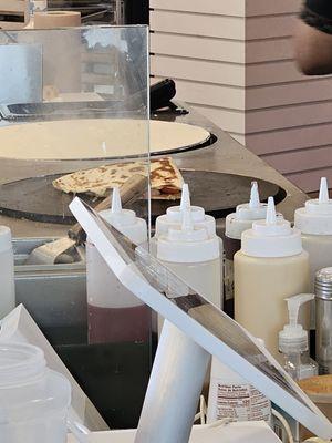 Crepes being made at the ice cream parlor