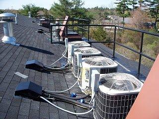 Condensers installed on roof of condo in Bal Harbor