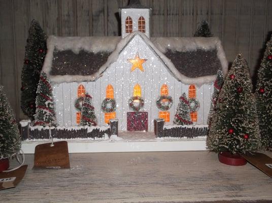 Lighted Putz houses provide an enchanting holiday glow.