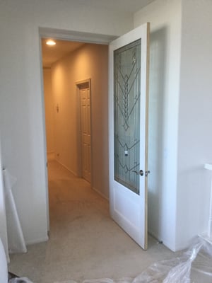 Very nice 8 ft tall glass door installed in the hall to separate living area from bedrooms