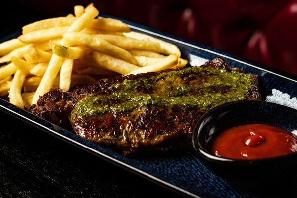 New York Steak, served with truffle fries and chimichurri