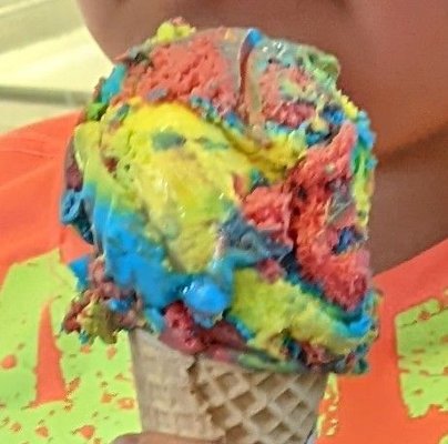 Superman ice cream on a sugar cone.