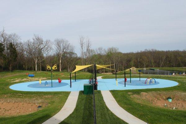 Splashpads with sunshades.