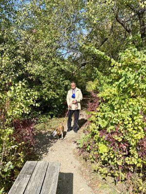 My husband and our dog on a lovely hike