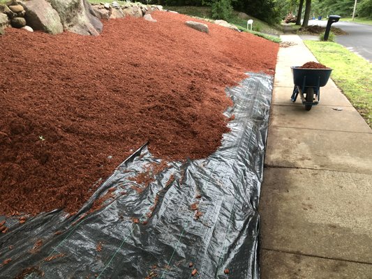 A thick layer of weed block is key to keeping the area looking its best