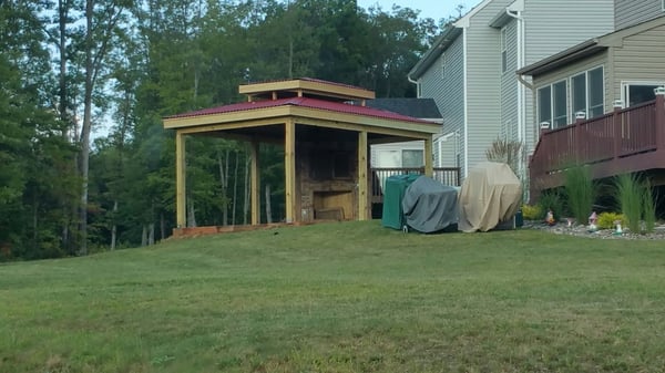 Pagoda with exterior entertainment stand and liquor cabinet