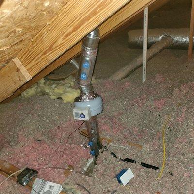 Gas dryer vent with clean out access doors in attic