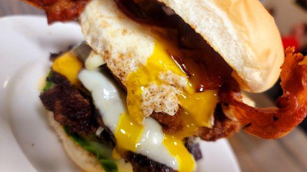 Barnyard Burger, Double Smashburger, Fried Green Tomato. Crisp Bacon, & Fried Egg