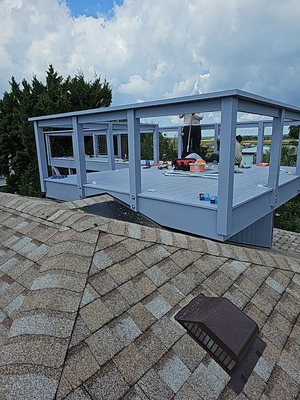 After- New deck and steel cable railings going in