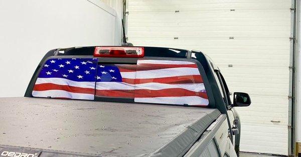 Flag decals installed on this 2021 GMC Canyon